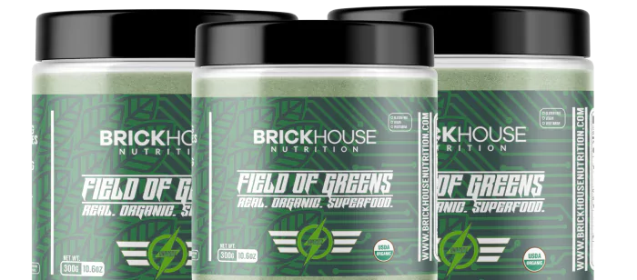 Three jars of BrickHouse Nutrition Field of Greens, an organic superfood supplement.