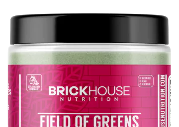 Brickhouse Nutrition Field of Greens supplement container with black lid and pink label.