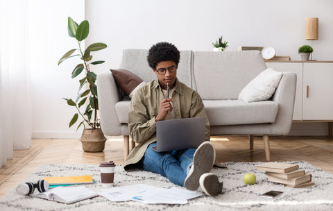 man concentrating and studying