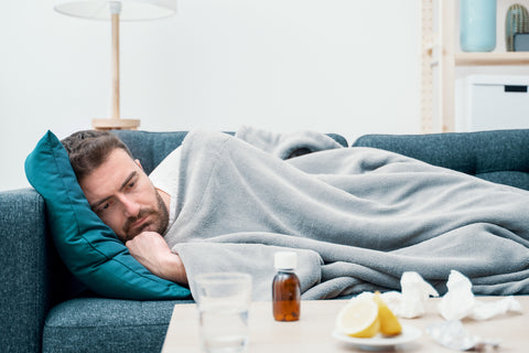 man sick and at home