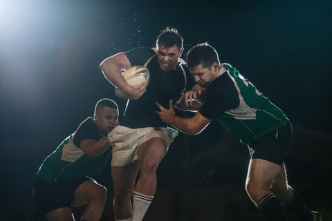 men playing rugby