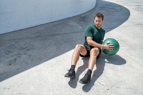 russian twist with exercise ball