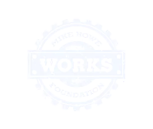 A circular logo with the text 'WORKS' in the center and 'MIKE ROWE FOUNDATION' written around it.
