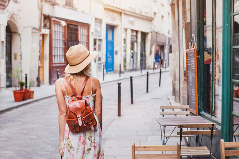 woman tourist walking around town and shopping