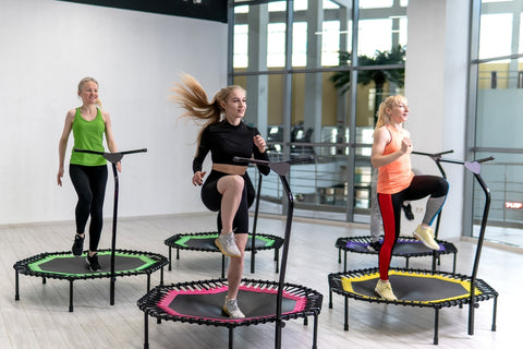 women working out on the trampoline