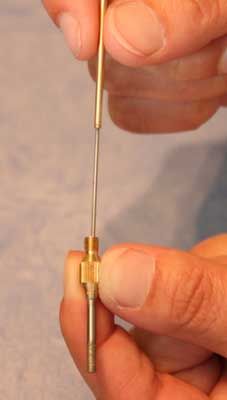 Drill Bit And Ejector Needle