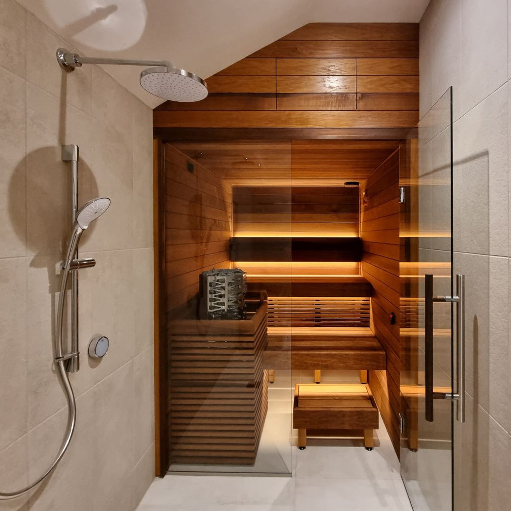 Bespoke indoor sauna installation with a white tiled floor