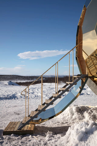 The stairs into the golden egg sauna