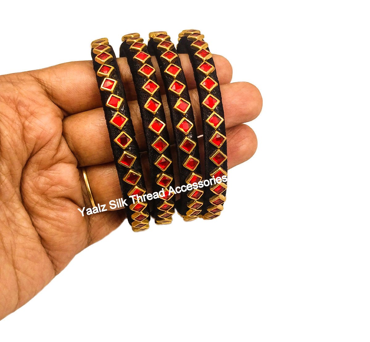 Yaalz Silk Thread Kundan Stone Bangle Set In Black & Red Colors