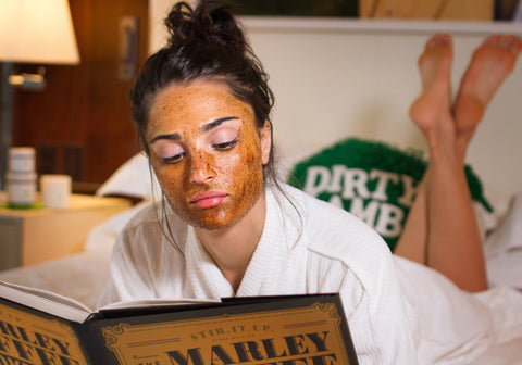 Lam Khan, founder of Dirty Lamb, relaxing and wearing the Turkish Coffee Mask, one of Dirty Lamb's bestselling vegan, natural, clean, and high-quality products.