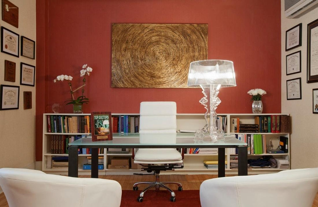 A sophisticated office space with abstract wall art.