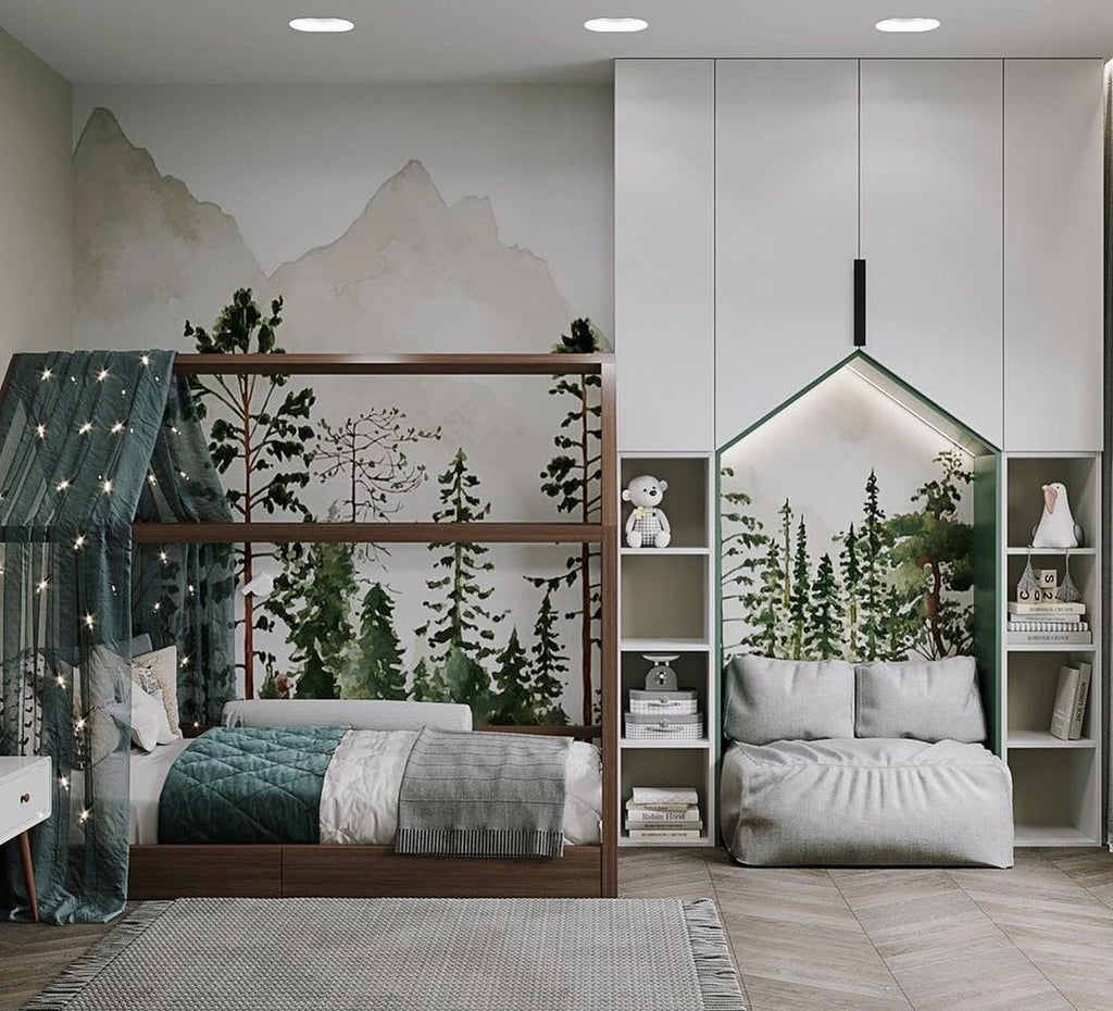 A children’s bedroom decorated with painted woodland scenes on the walls