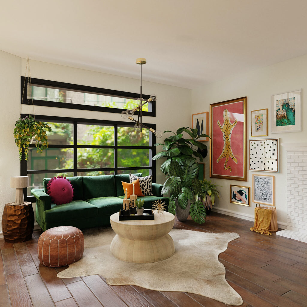 A wooden-floored lounge decorated with a rug, houseplants, and colorful wall art