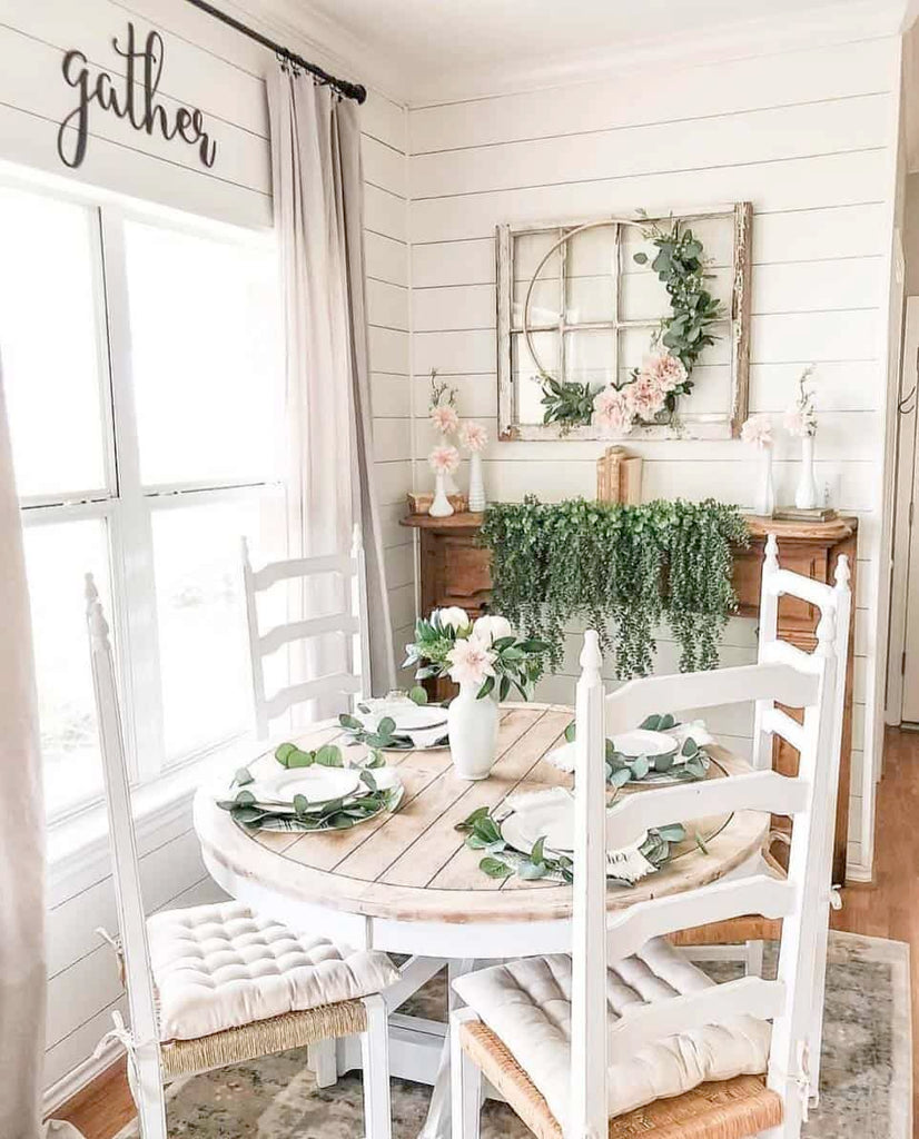 A white dining room set made with Furniture