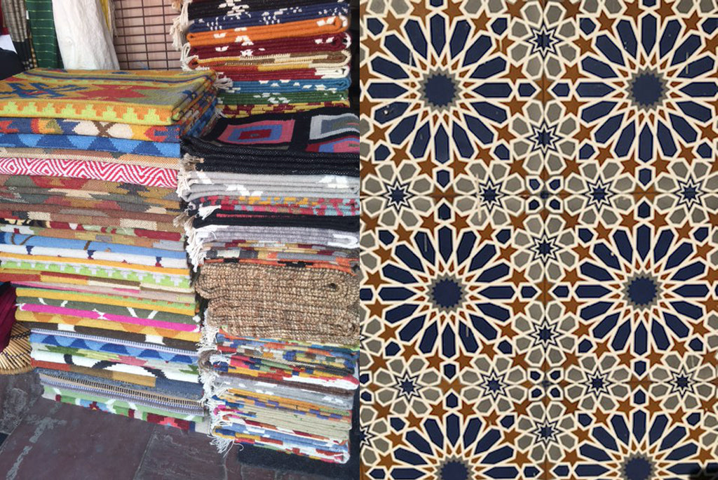 Stacks of colorful blankets at an outdoor market in India