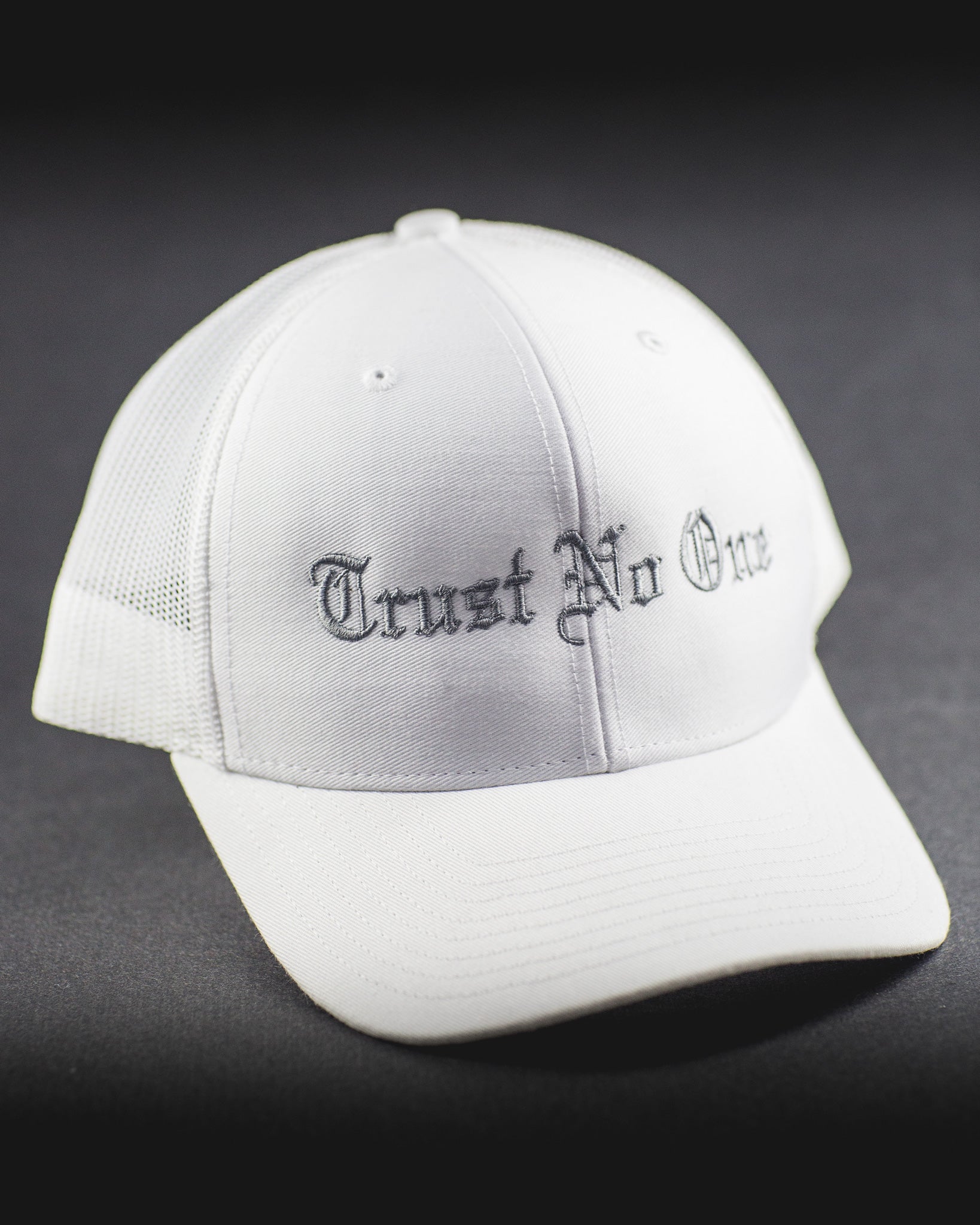 Trust No One Trucker Snap Back - White with Silver Lettering