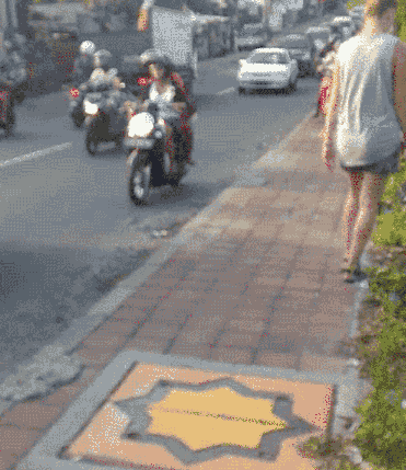 makers travelers se asia bali traffic driving on sidewalk
