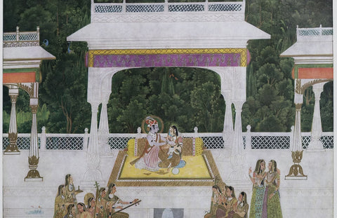 Kishangarh art - Krishna and Radha are positioned at the centre, surrounded by their female companions.