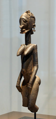 Dogon ancestral figure held by the Louvre, wood, c. 17th-18th century AD.