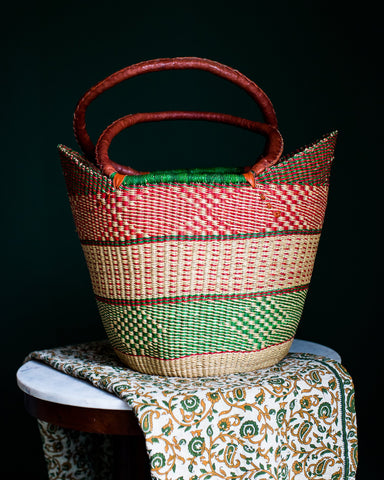 african market basket and blocked printed green kantha sari throw