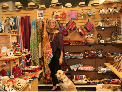 Teresa in Lucia's World Emporium with her dog Echo
