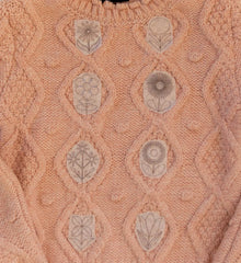 Embroidery Pattern Sample on a pink sweater