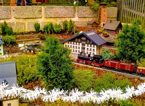 Model train landscape with home and nature accessories