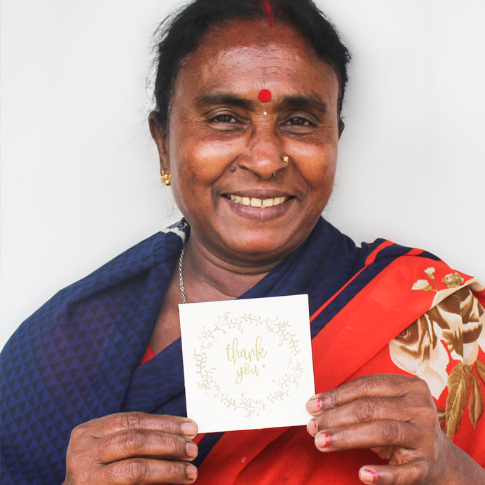 bangaldesh woman saying thank you for your purchases of fair trade artisan goods from do good shop