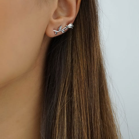 Our sterling silver rose earrings designed to climb up the ear are the perfect everyday accessory.
