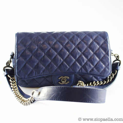 I am thinking of purchasing this Chanel pouch but it says with