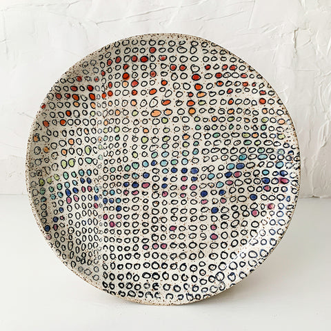 Heidi Fahrenbacher stoneware plate with screen printed designs.