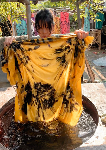 making a tie dye dress in Indonesia