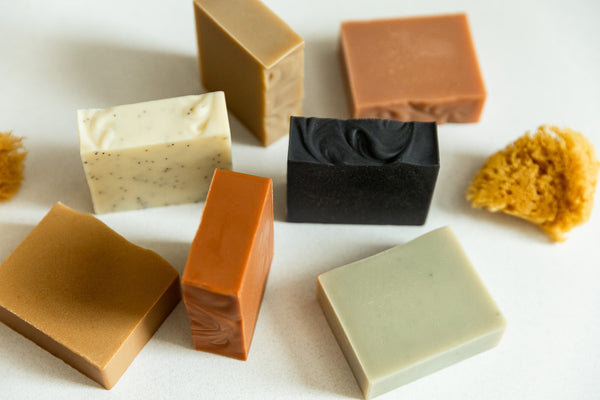 A collection of natural bar soaps showing the slight variation in color and texture