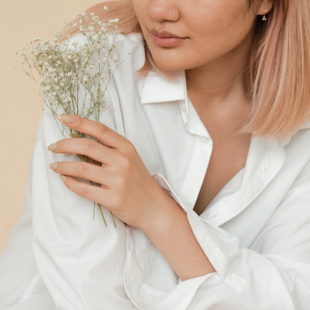 Woman smelling flowers