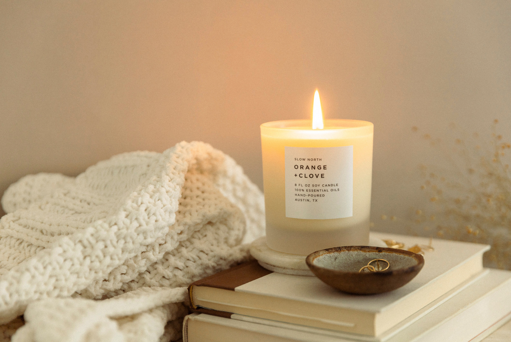 slow north orange + clove candle