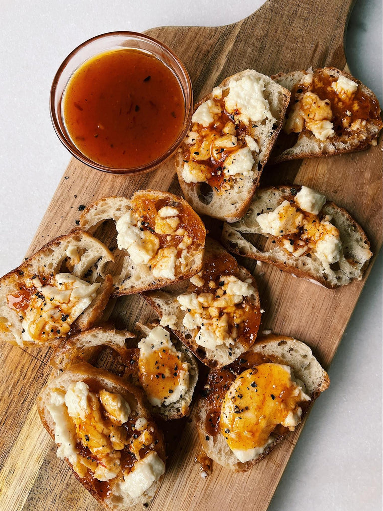Pepper Jelly and Honey Goat Cheese Crostini