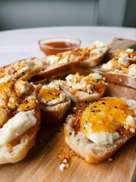 Pepper Jelly and Honey Goat Cheese Crostini