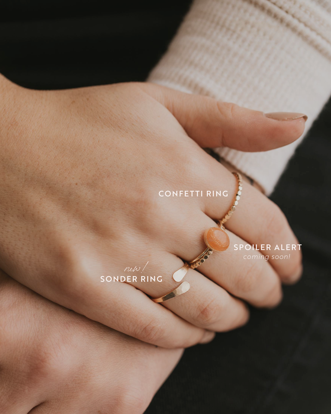 Stacking rings ideas by Hello Adorn, this stack features a 3 ring stack that includes two statement rings in Sonder, an open ring and a gemstone ring along with two hammered rings.