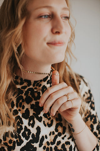 Britlyn holding her Confetti Choker.