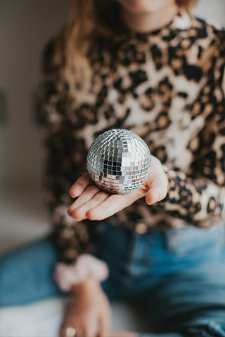 Britlyn and her disco ball.