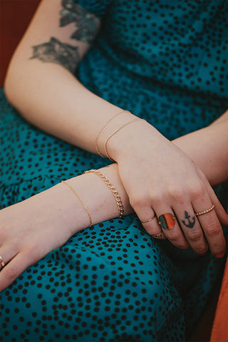 Britlyn's bracelet and ring stack.