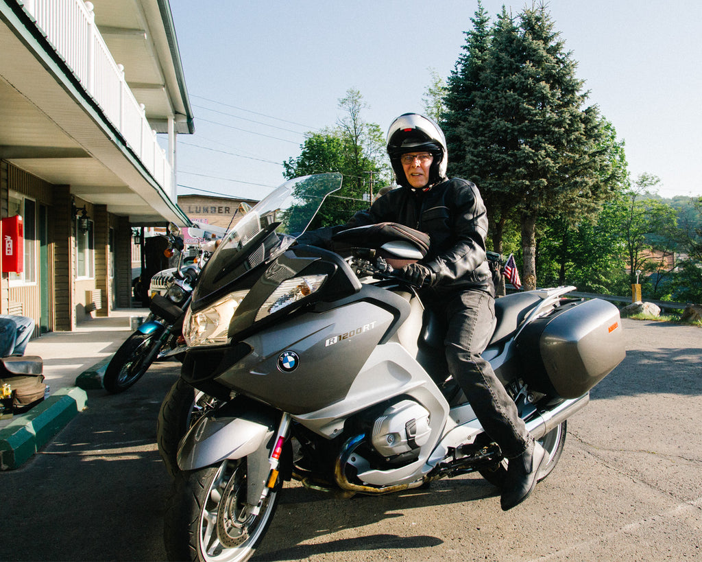 Dad on Grey BMW getting ready to leave parking lot