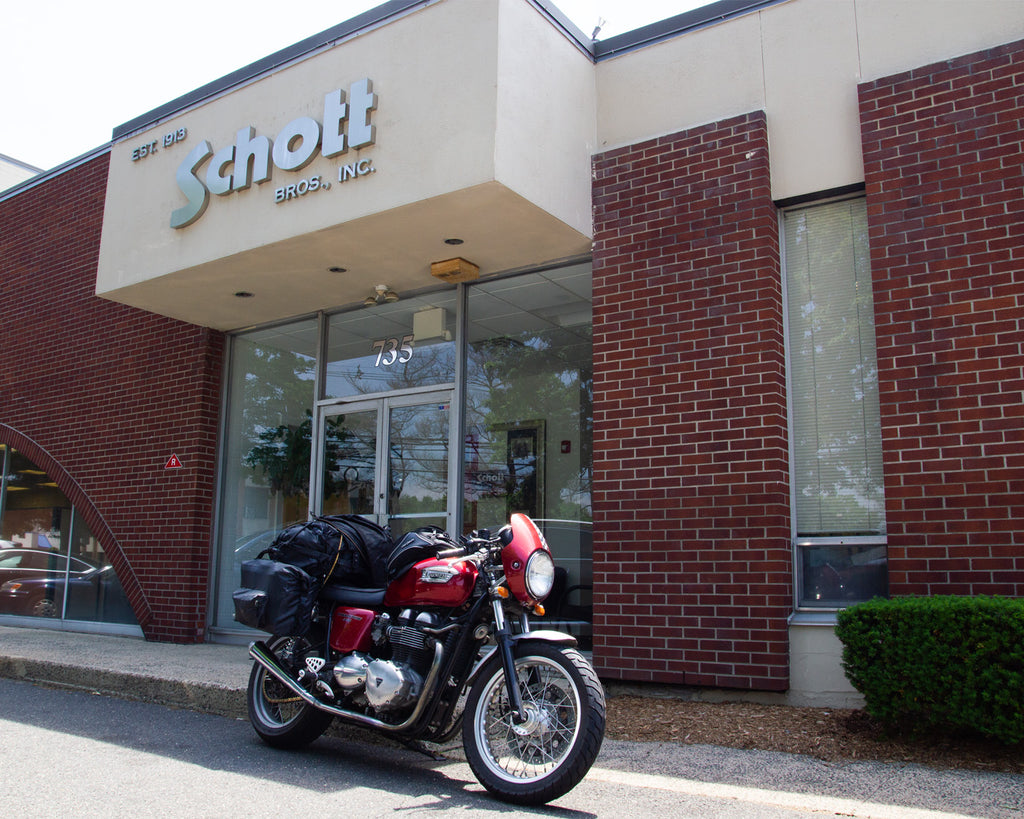 Katy's Triumph Thruxton parked in front of the Schott NYC headquarters