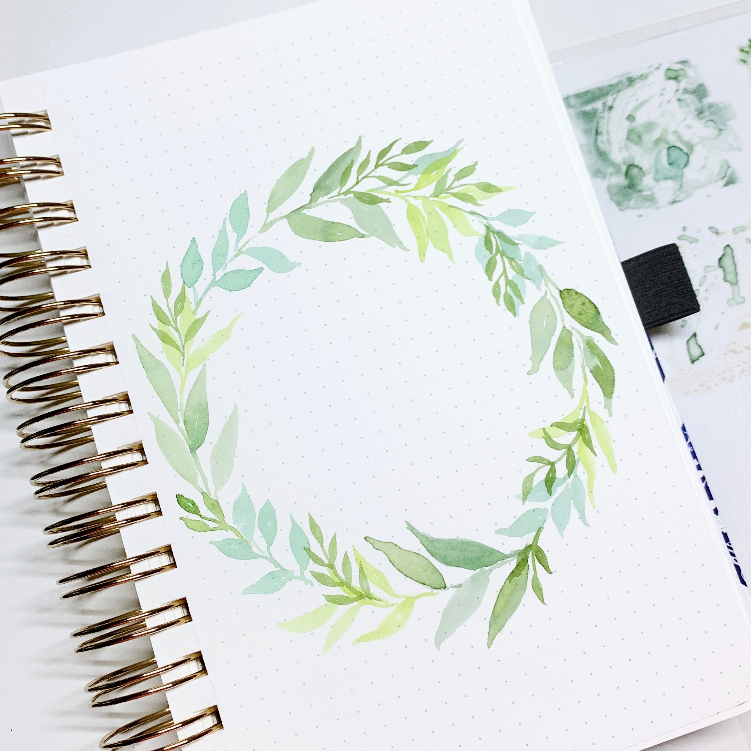 Learn how to create a holiday watercolor wreath with Adrienne from @studio80design!