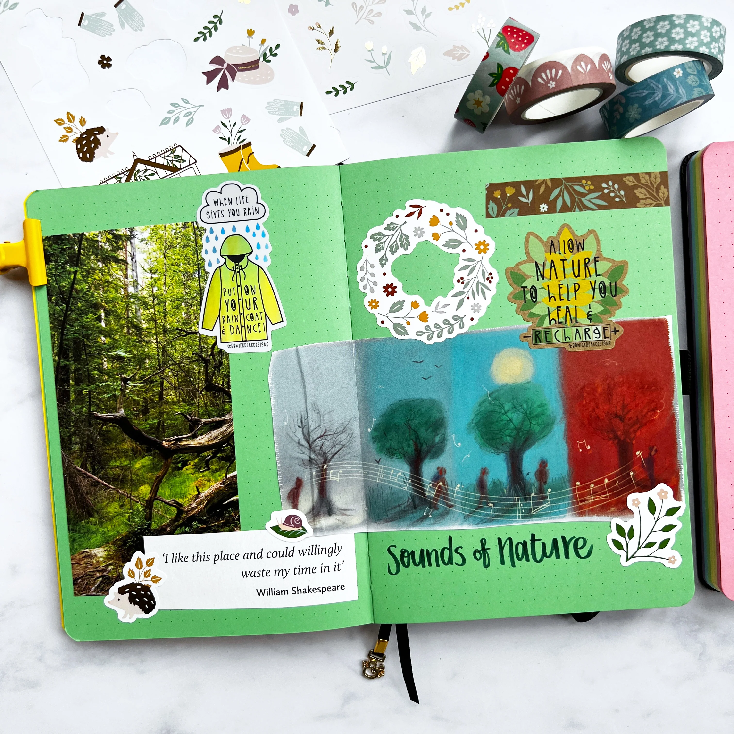 Green journal page with images of nature and associated stickers and washi