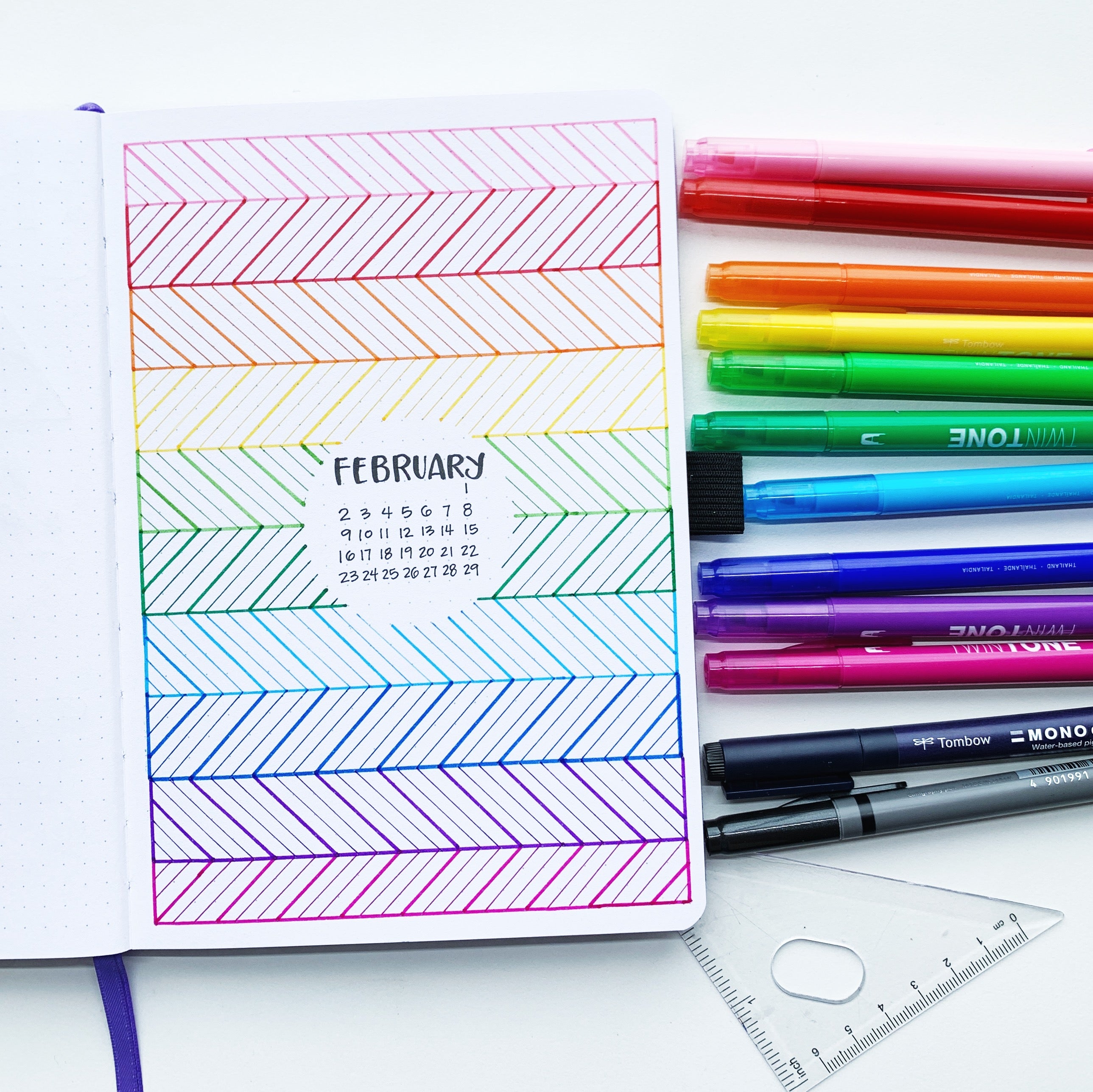 Learn how to create a February Rainbow Pattern Cover Page with Adrienne from @studio80design!
