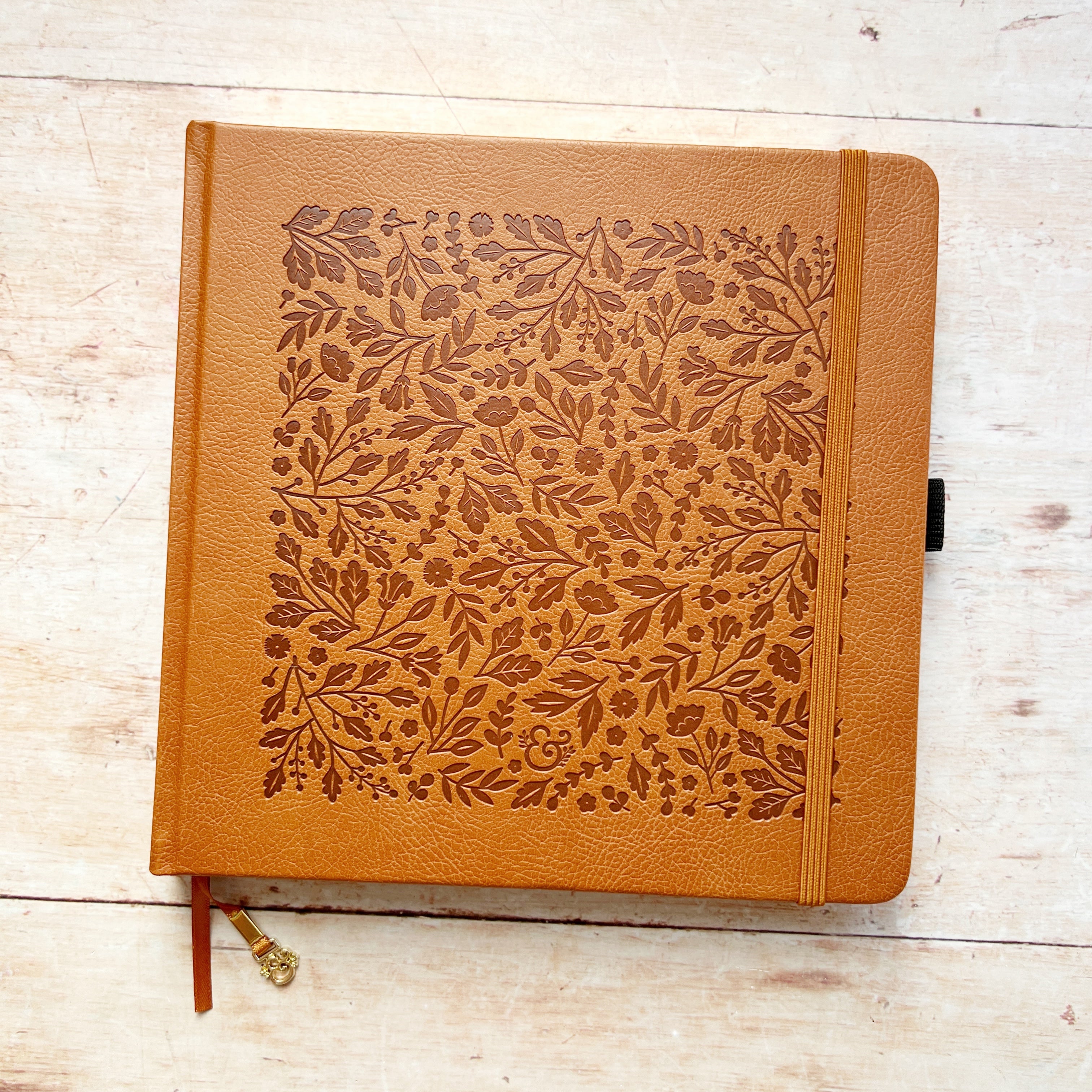 Brown square journal with leaf pattern