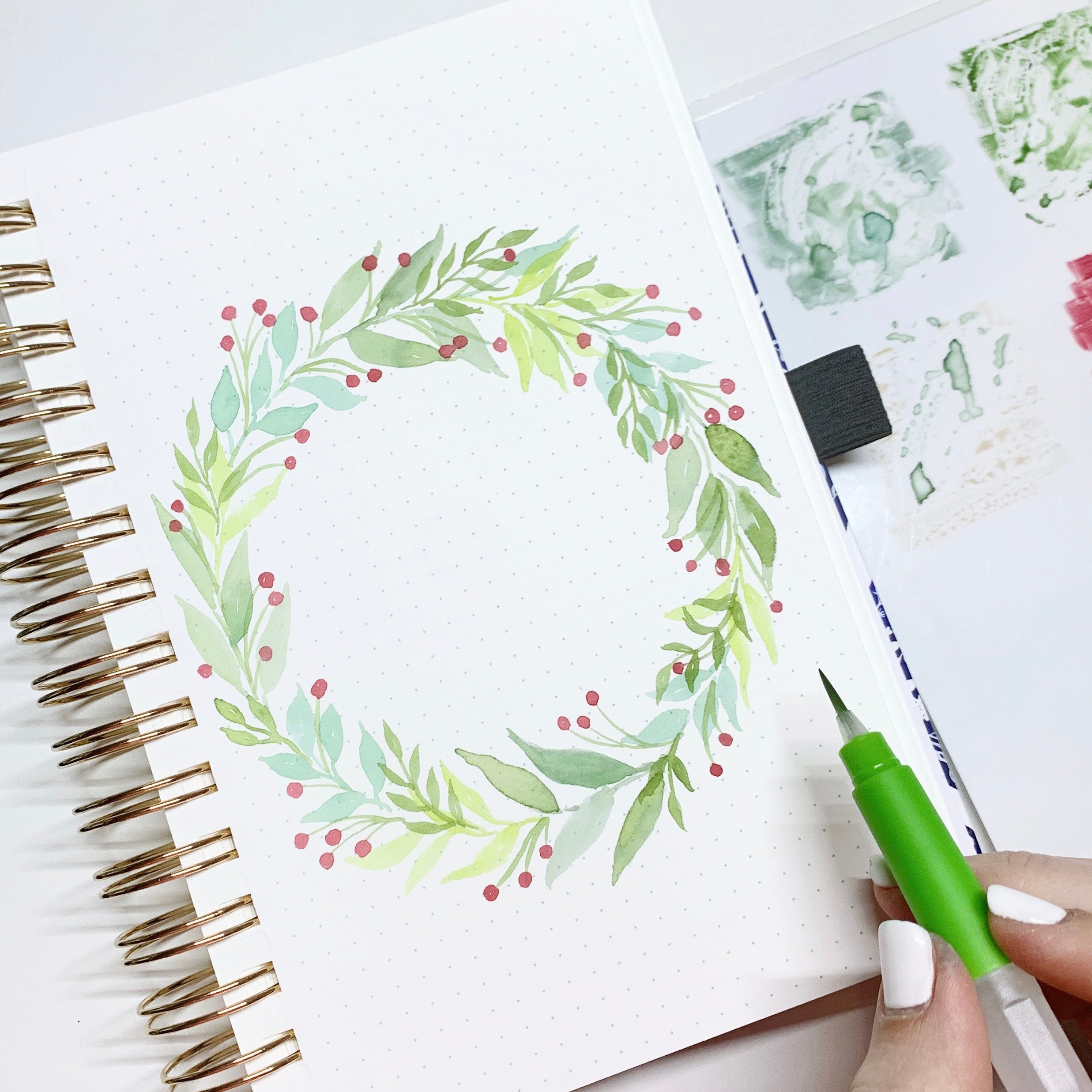 Learn how to create a holiday watercolor wreath with Adrienne from @studio80design!