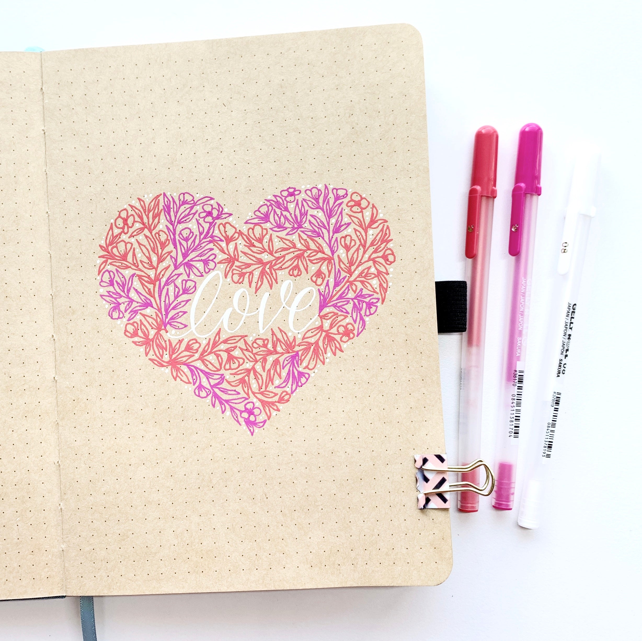 Learn how to create a floral heart illustration in the NEW Kraft Paper Dot Grid Notebook with Adrienne from @studio80design!