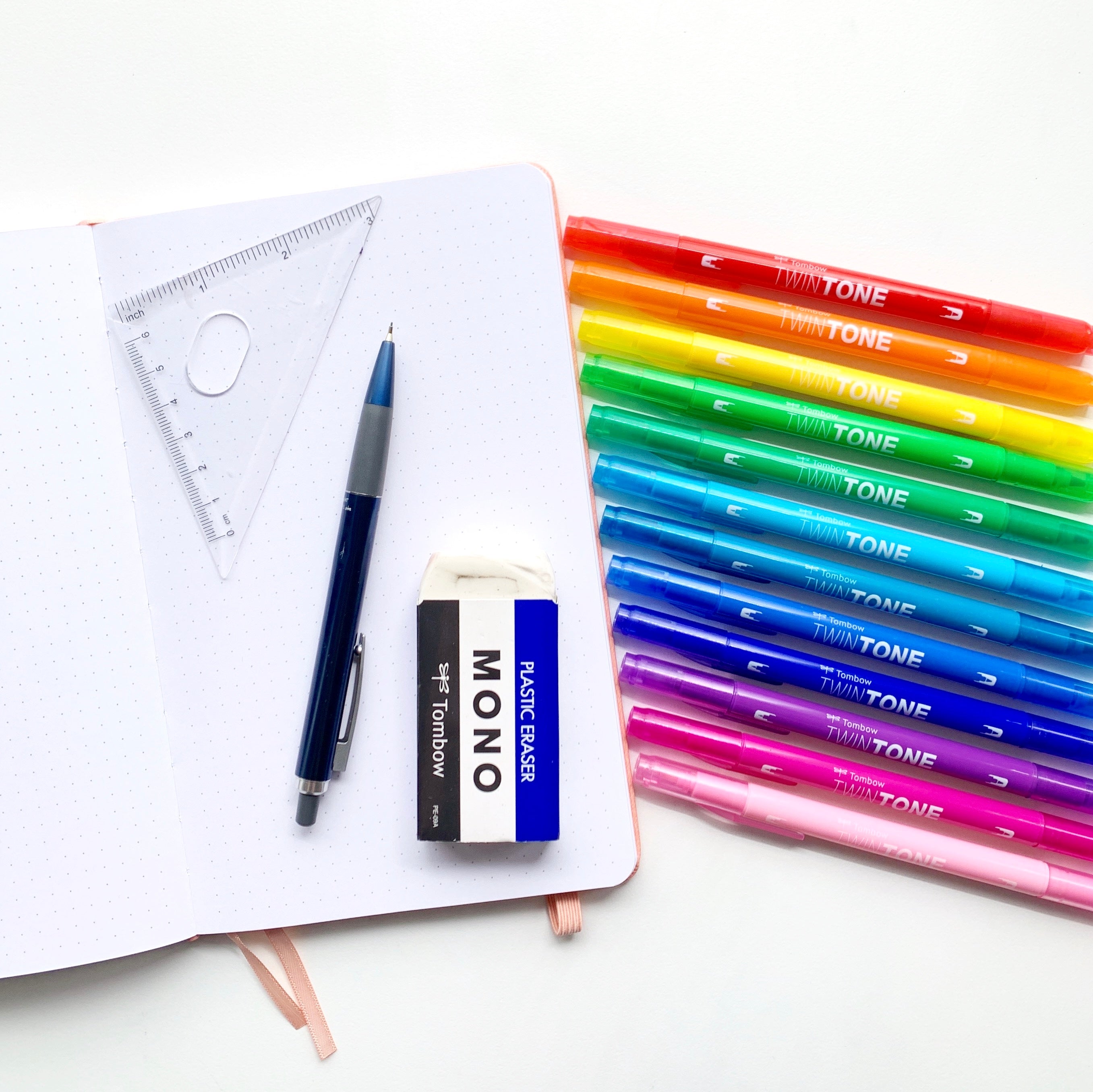 Learn how to create a rainbow pattern in your dot grid notebook with Adrienne from @studio80design